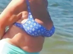 Grandma with massive titties on beach! Inexperienced webcam!