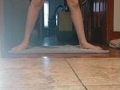 Petite red head desperately pees in her shorts