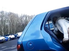 Cute girl flashes ass and cunt on public parking.