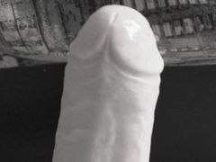 Slim Mature MILF with hairy pussy fucks with a huge dildo.